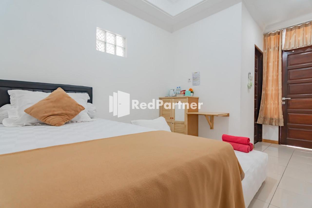 Langkar Guest House Syariah Mitra Reddoorz Samarinda Exterior foto
