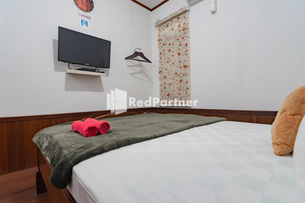 Langkar Guest House Syariah Mitra Reddoorz Samarinda Exterior foto