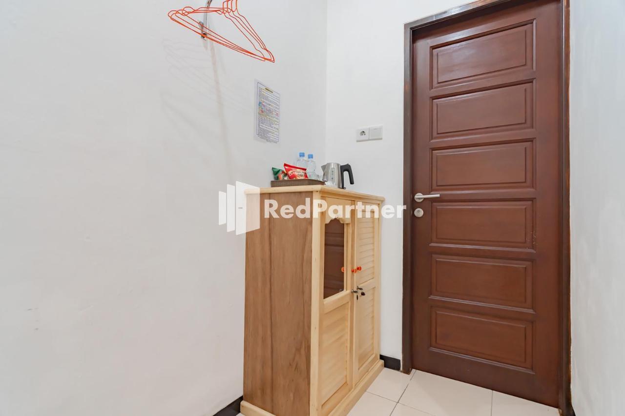 Langkar Guest House Syariah Mitra Reddoorz Samarinda Exterior foto