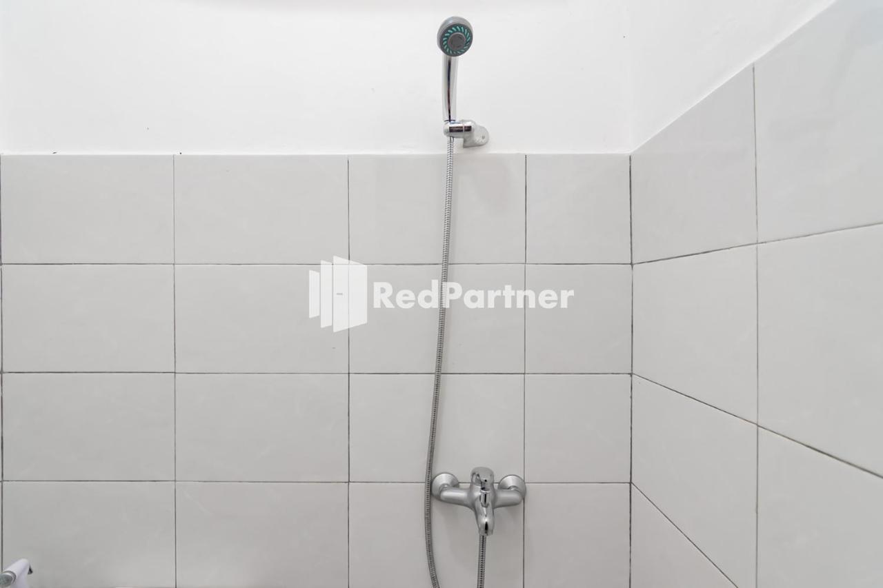 Langkar Guest House Syariah Mitra Reddoorz Samarinda Exterior foto